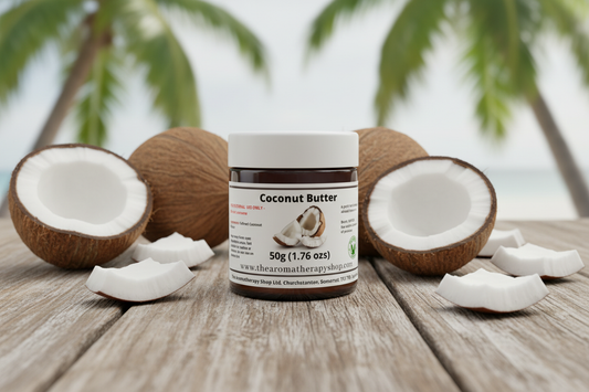Coconut Butter 50g jar with randomly placed coconuts