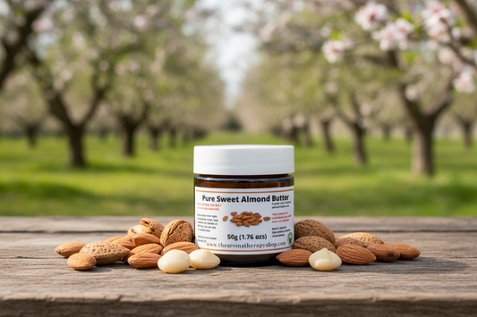 Pure Sweet Almond Butter 50g jar in natural orchard setting