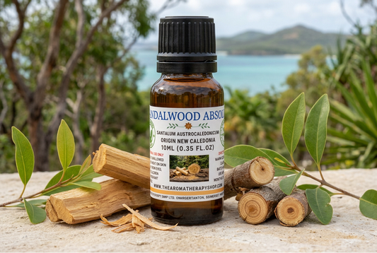 Sandalwood Absolute showcase with a new New Caledonian background and natural limestone surface