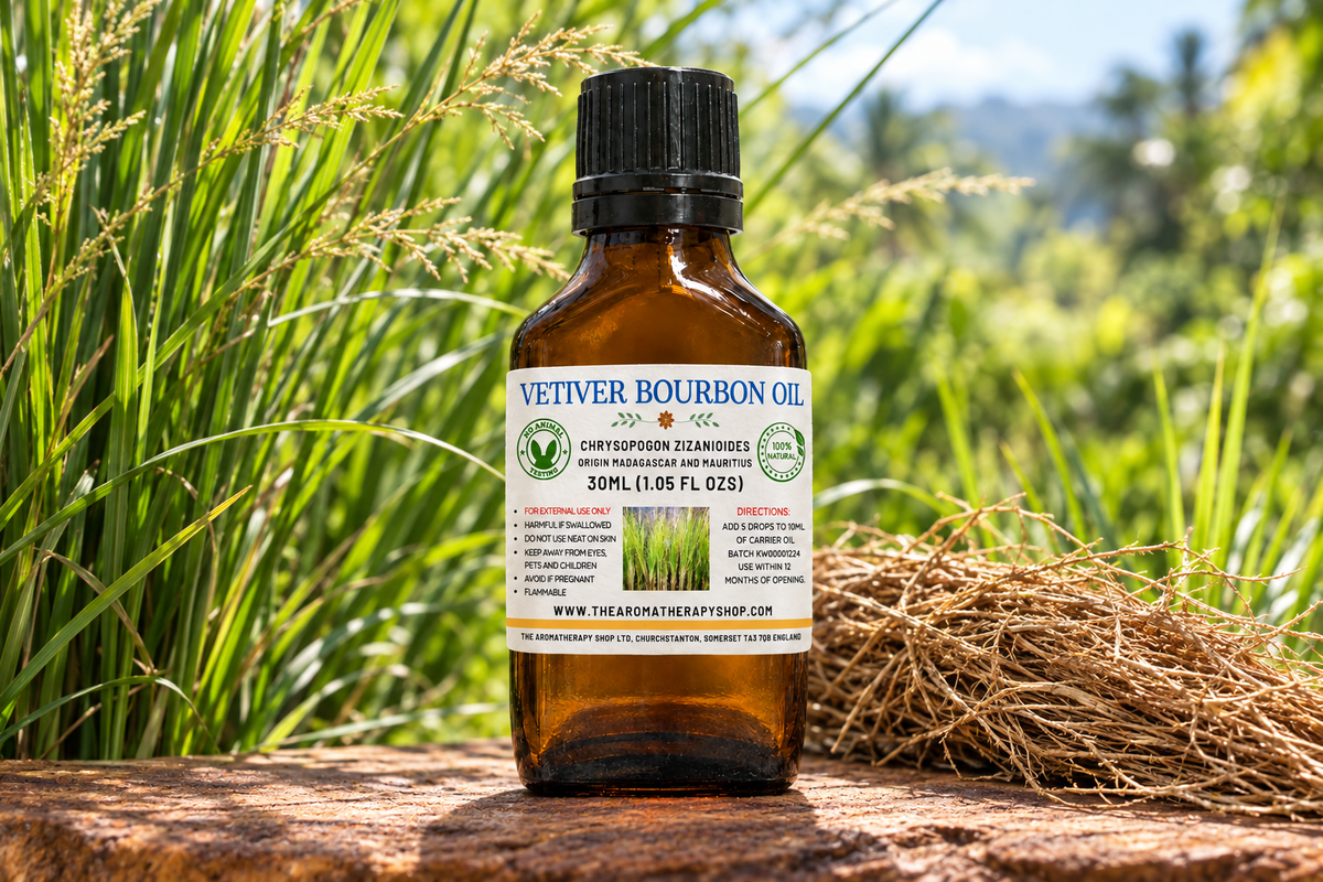 Vetiver Bourbon showcase with the approved 30 ml bottle, supplied label and fresh vetiver elements on weathered hardwood